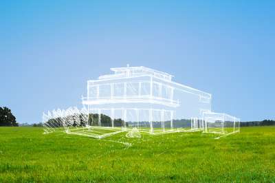 Wiese mit weißer Hausskizze darüber